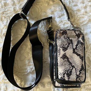 Amy Kestenberg on top of the world water bottle crossobody bag